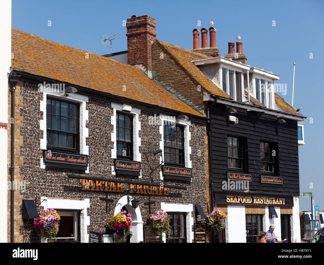 View of the 'Tartar Frigate' a historic, 18th century flint seafood restaurant on the sea front in Broadstairs, Kent. Stock Photo