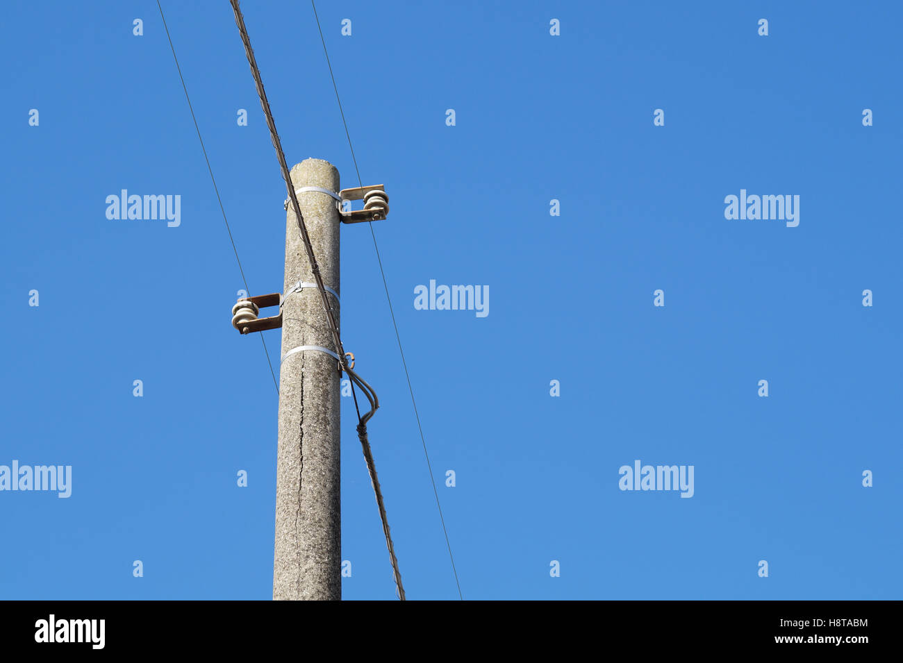 electricity pylon with blue sky background Stock Photo - Alamy
