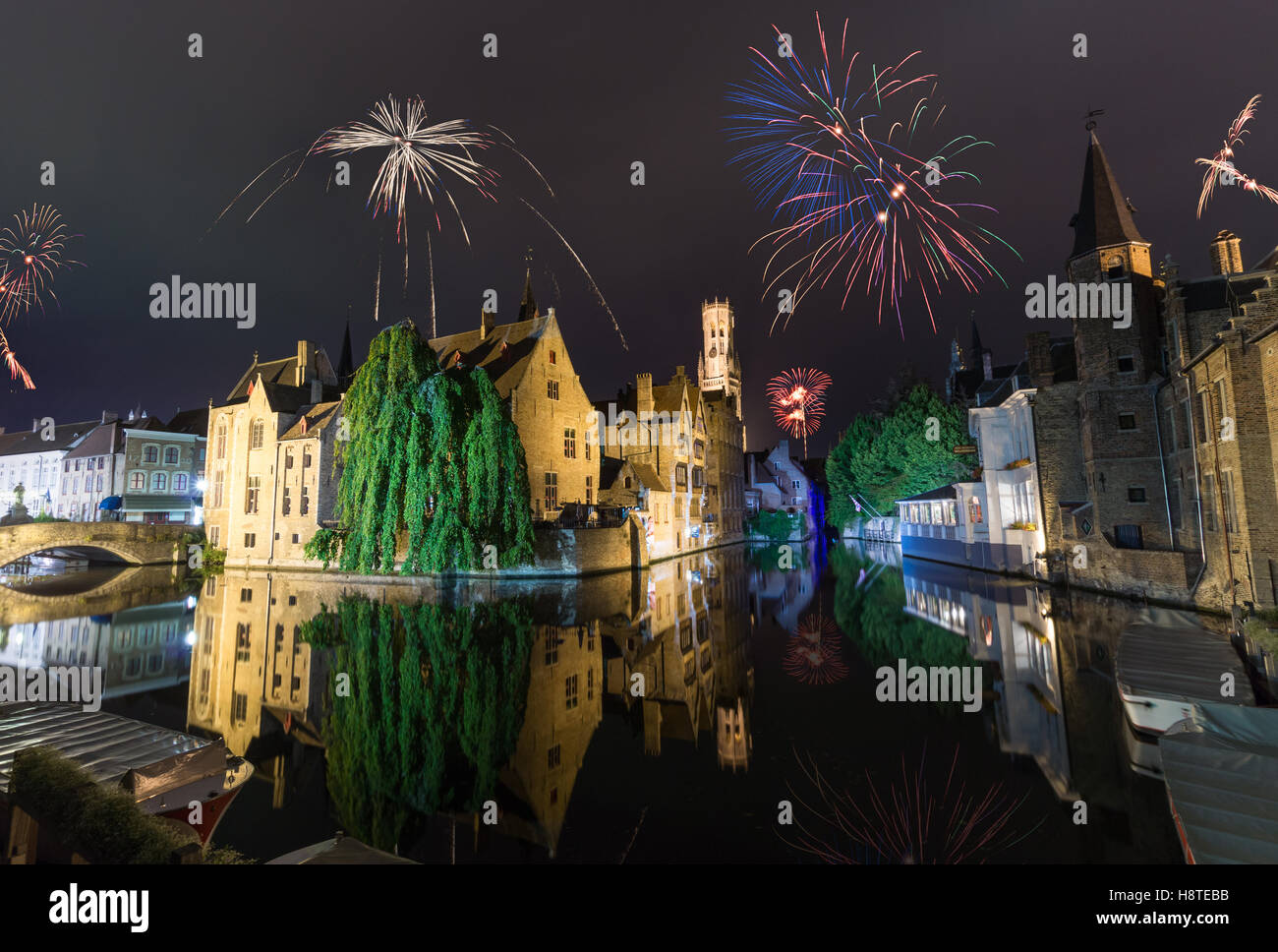 Firework over the old town of Bruges. New years Eve in Belgium Stock