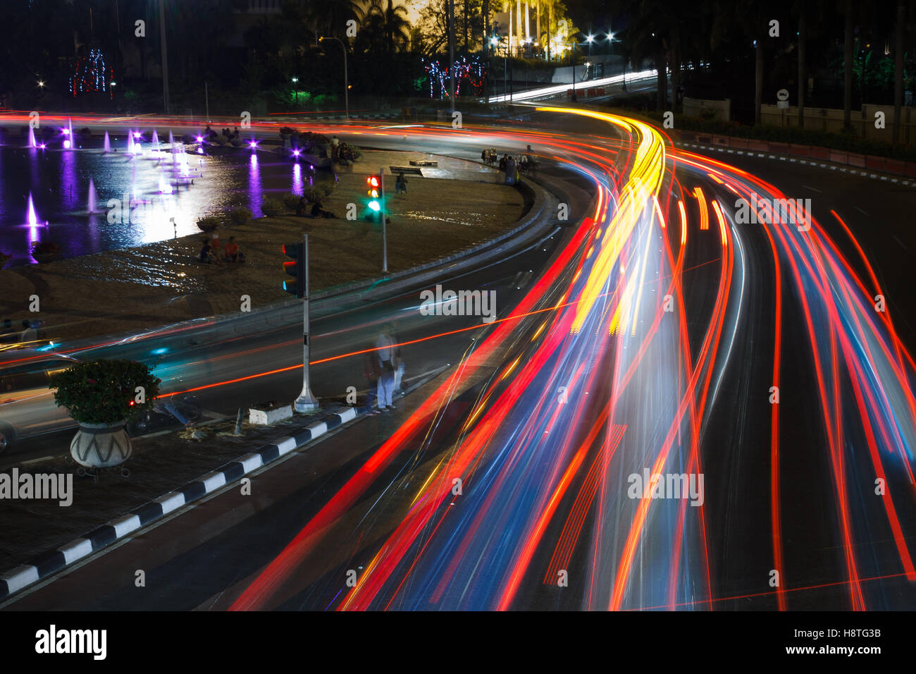 Light trails from vehicles traffic on the street at night. Long exposure photography. Stock Photo