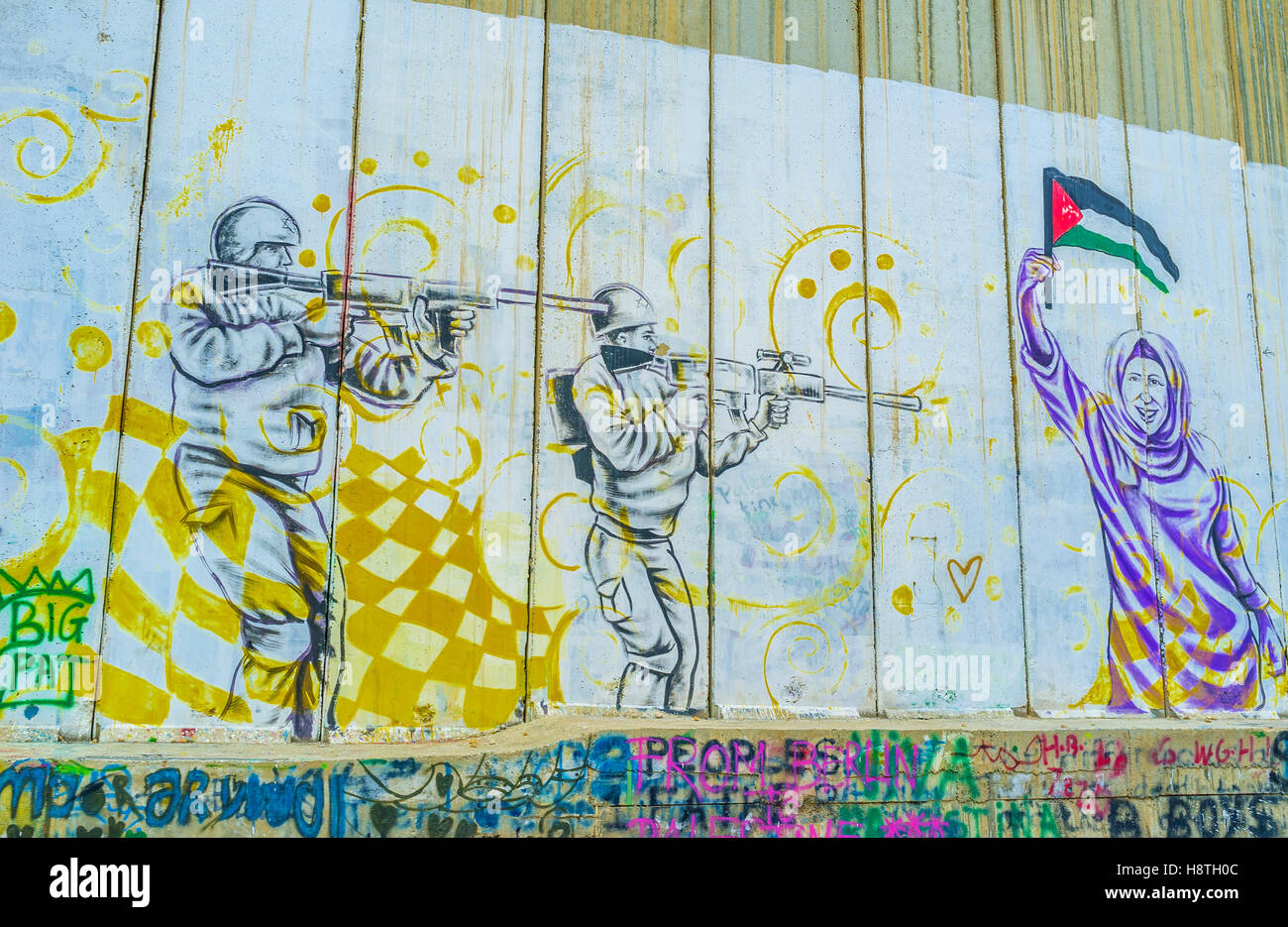 The mural that depicting Israeli - Palestinian conflict on the separation wall Stock Photo