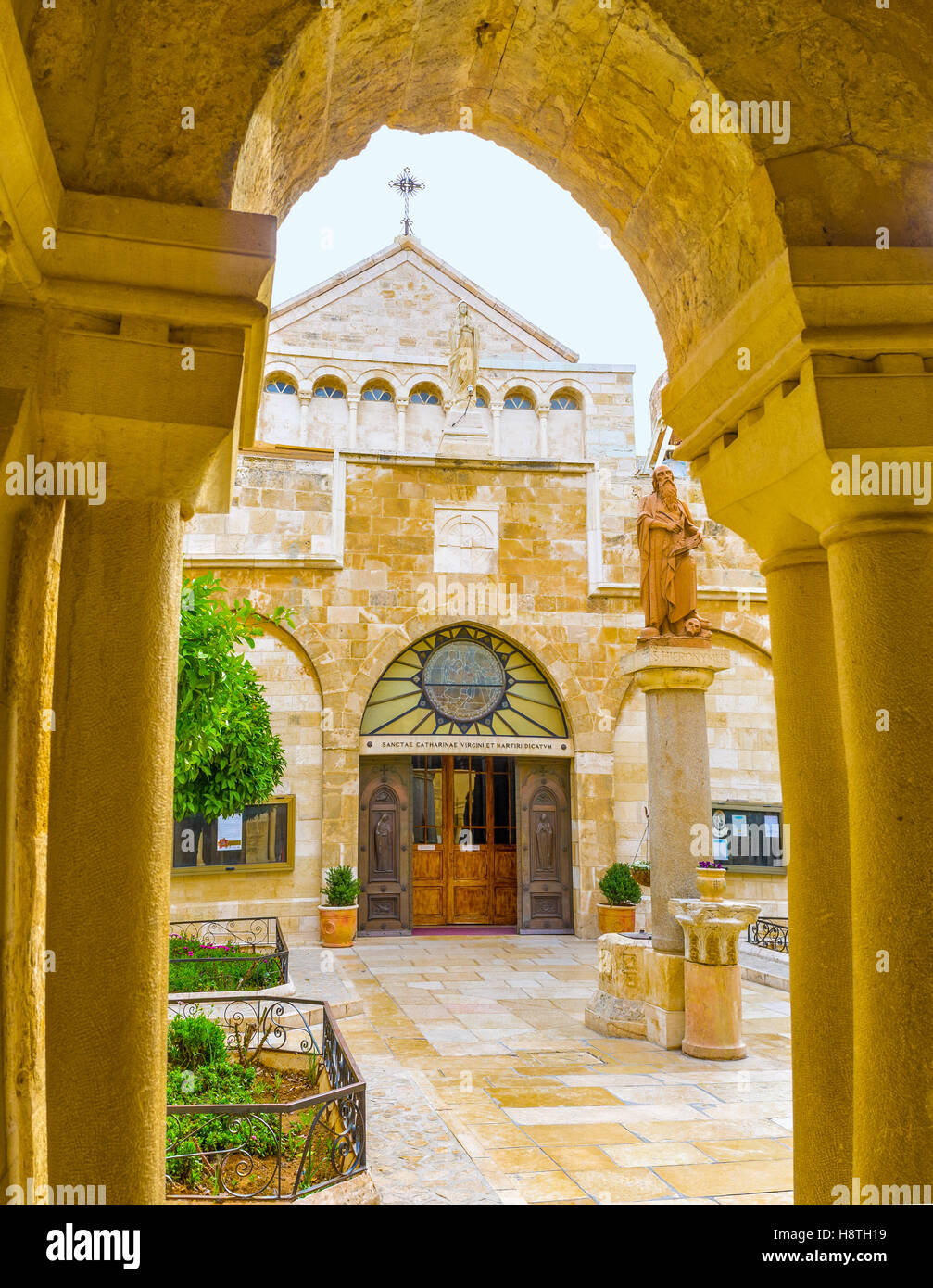 The view on the Church of the St. Catherine through the Franciscan courtyard Stock Photo