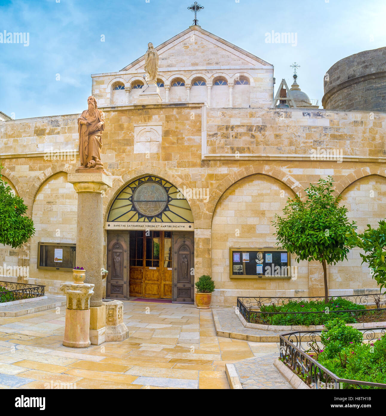 The view on the main entrance to the St. Catherine Church from the courtyard of the Church of the Nativity Stock Photo