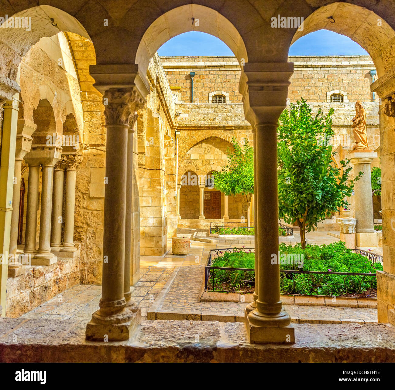The view on the inner courtyard of the Church of the Nativity and the monument to the St. Jerome Stock Photo