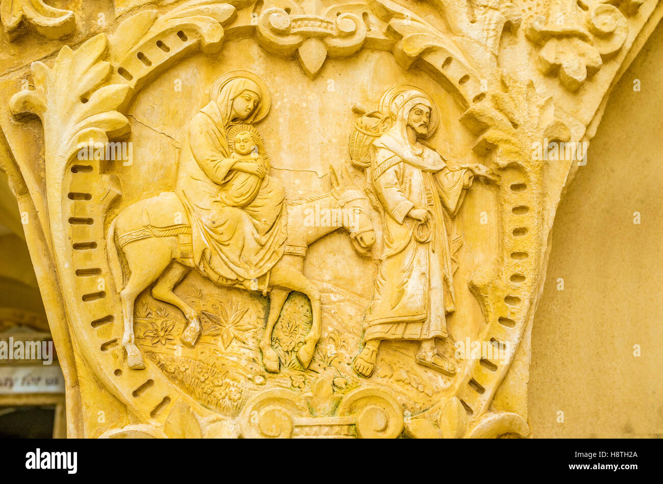 The beautiful stone medallion with the Holy Family located on the capital of the column of Milk Grotto Stock Photo