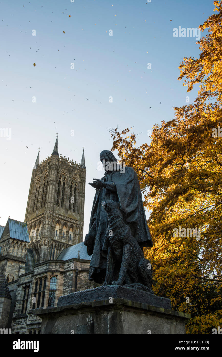 Autumnal display and Tennyson Memorial Statue within the grounds of Lincoln Cathedral, Lincolnshire, UK Stock Photo