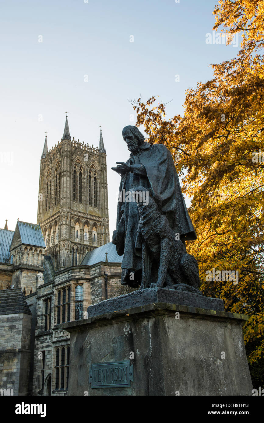 Autumnal display and Tennyson Memorial Statue within the grounds of Lincoln Cathedral, Lincolnshire, UK Stock Photo