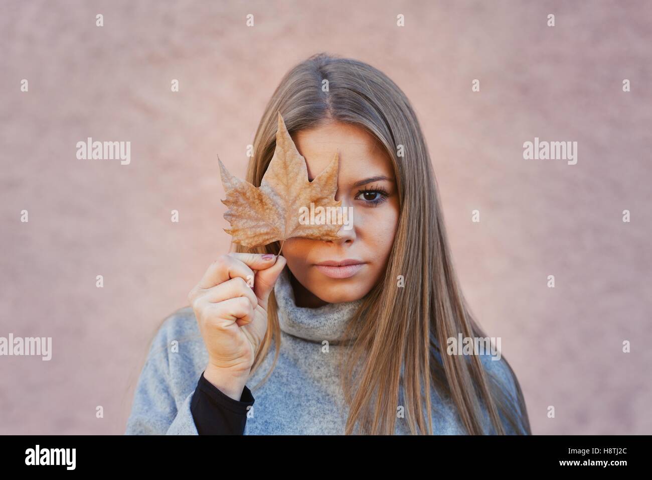 Pretty Girl with tree Leaf. Autumn Concept Stock Photo