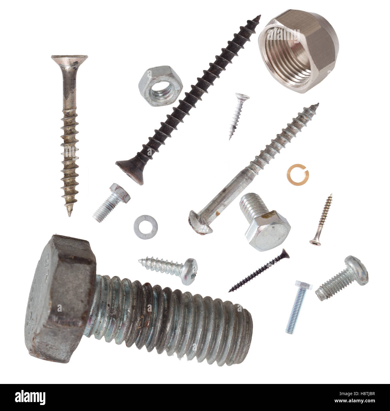 Assorted nuts, bolts, washers and screws isolated on white. Stock Photo