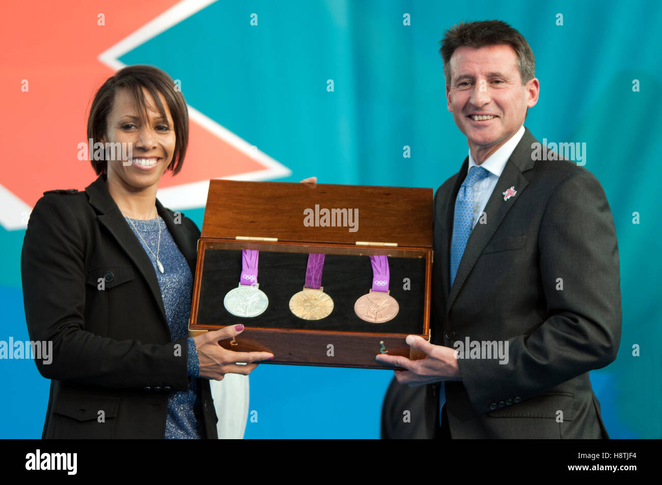 Dame Kelly Holmes and Lord Sebastian Coe displaying the new medals at the One Year To Go ceremony on 27th July 2011 Stock Photo