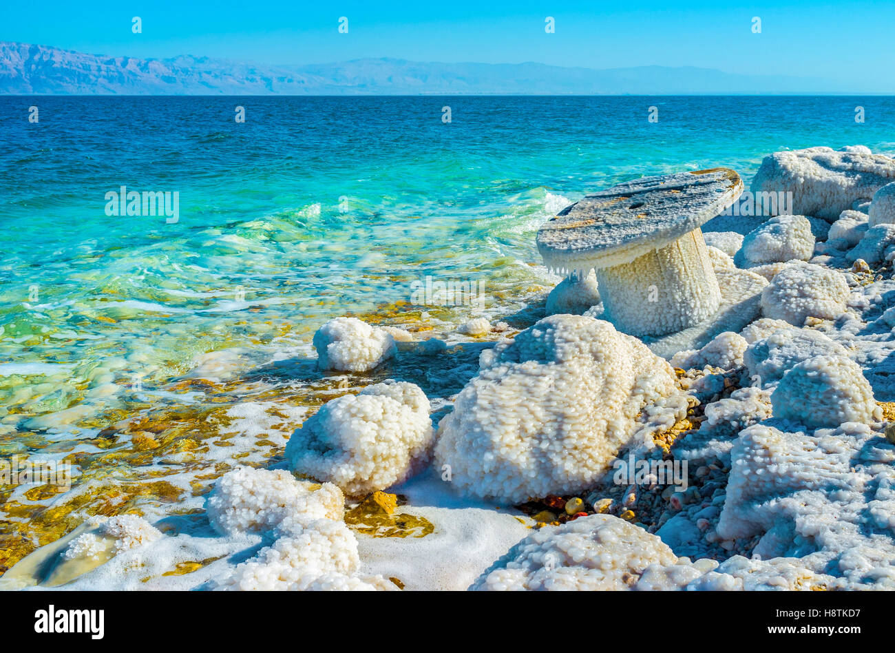 The Dead Sea is the natural border between Jordan to the east and Israel and Palestine to the west, Ein Gedi, Israel. Stock Photo