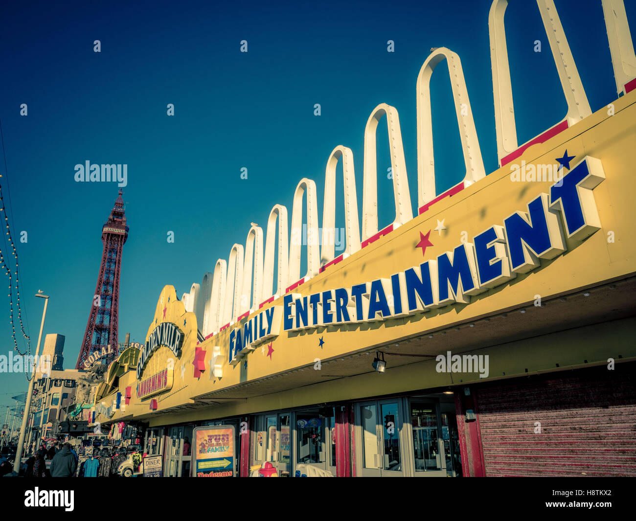 Golden Mile Family Entertainment Amusement Arcade sign on seafront, Blackpool, Lancashire, UK. Stock Photo