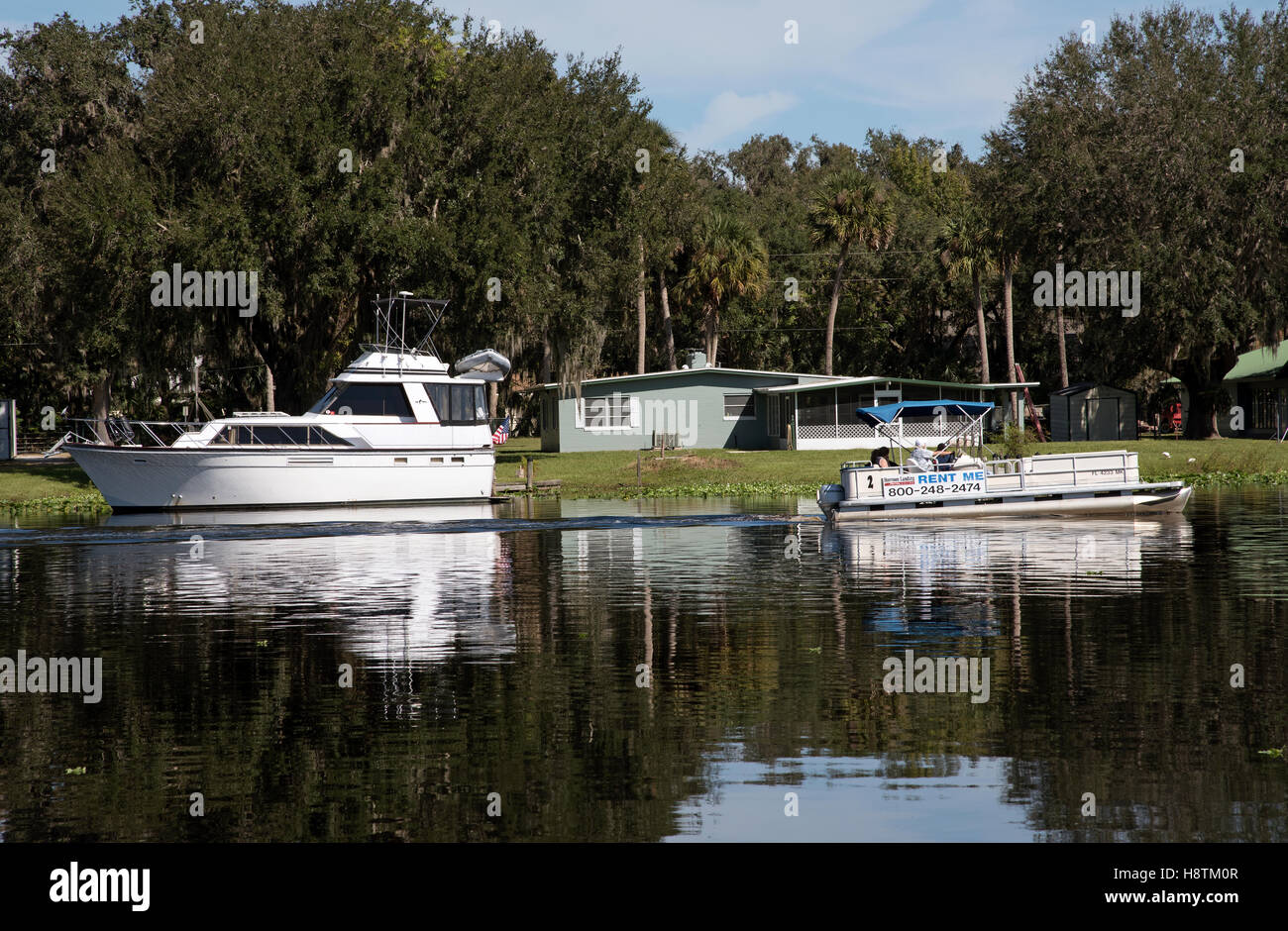 St Johns River in Volusia County Florida US The riverbank and boats close to Deland Florida USA