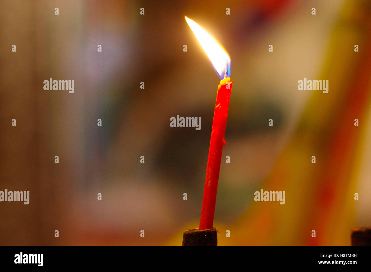 Five red candles burning hires stock photography and images Alamy