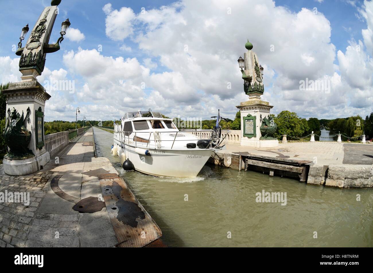 Pleasure boat on the Canal Bridge Briare , Loiret, France. The side channel of the Loire goes over the Loire built in 1890-1896 Stock Photo