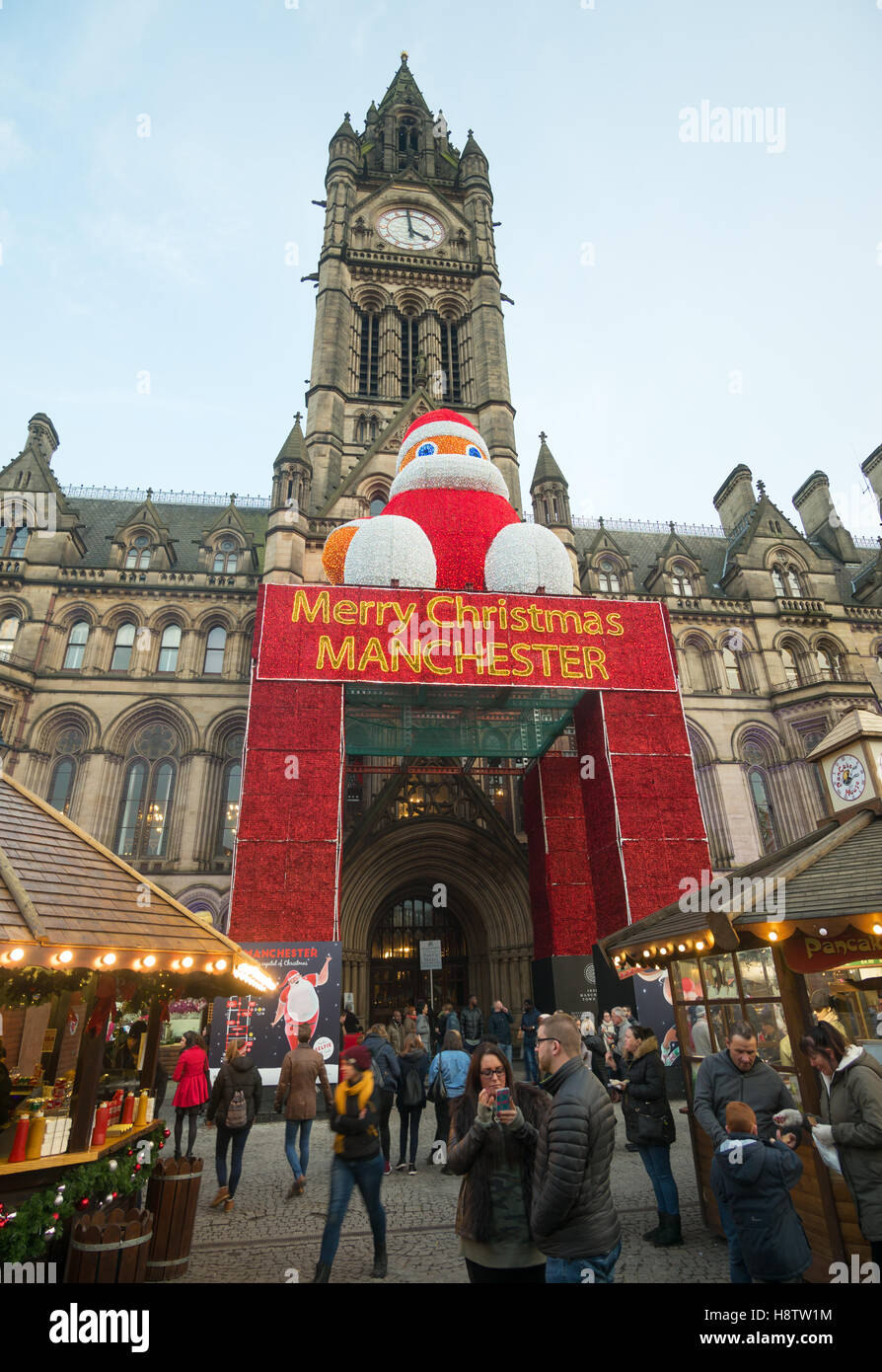 The Christmas market Manchester and the town hall, England, UK Stock Photo