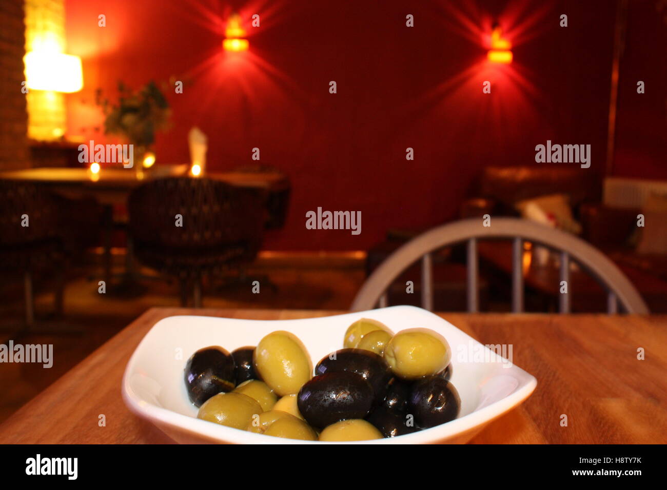 Olives in a pub / dining room setting Stock Photo Alamy