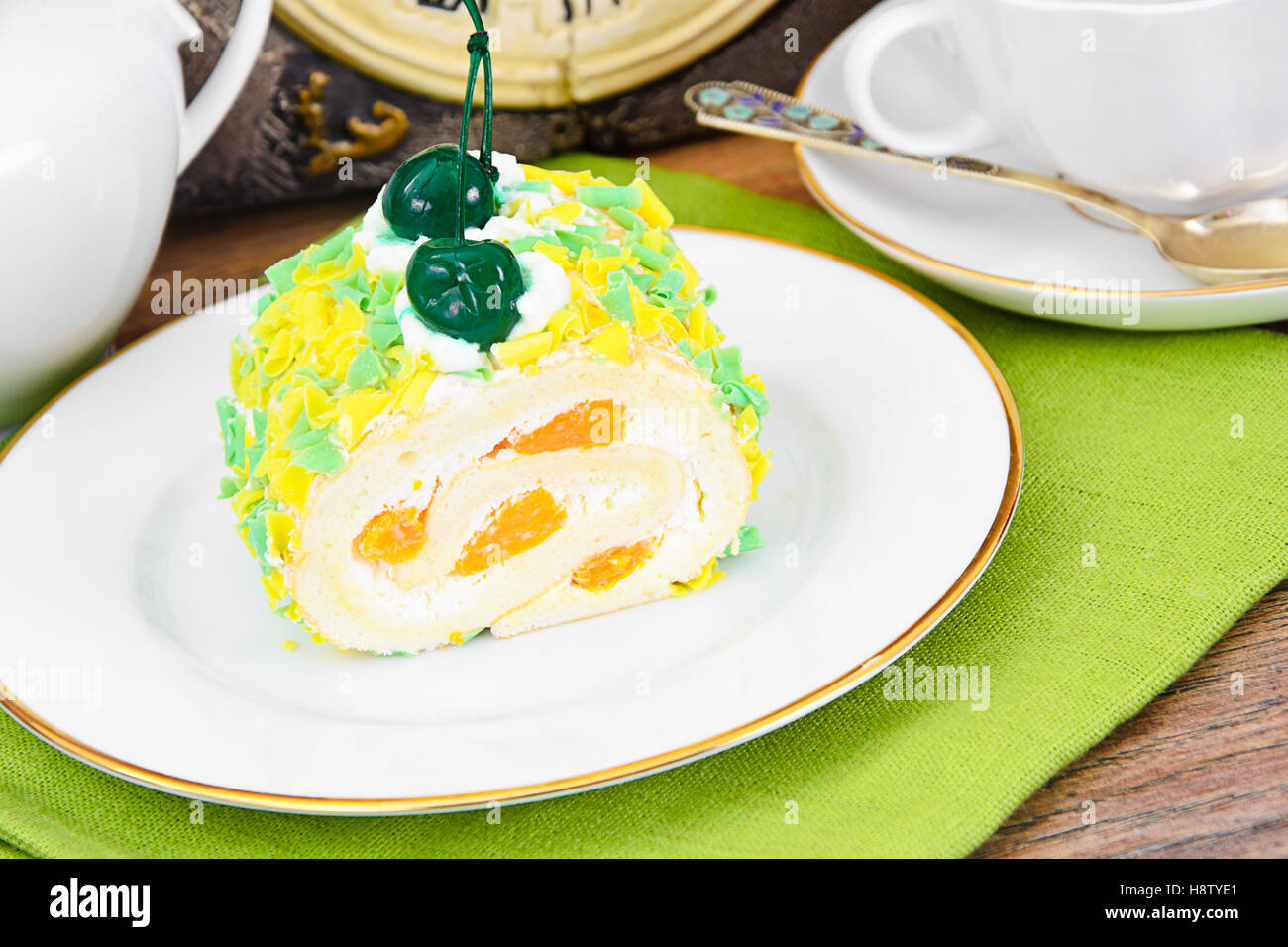 Sponge Roulade with Cream, Mandarin and Cherry Stock Photo - Alamy