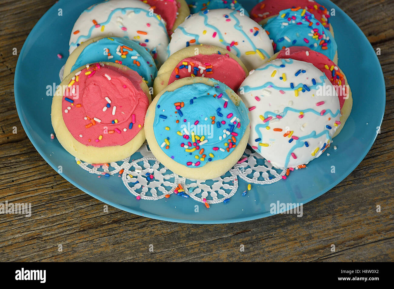 frosting on sugar cookies with sprinkles Stock Photo