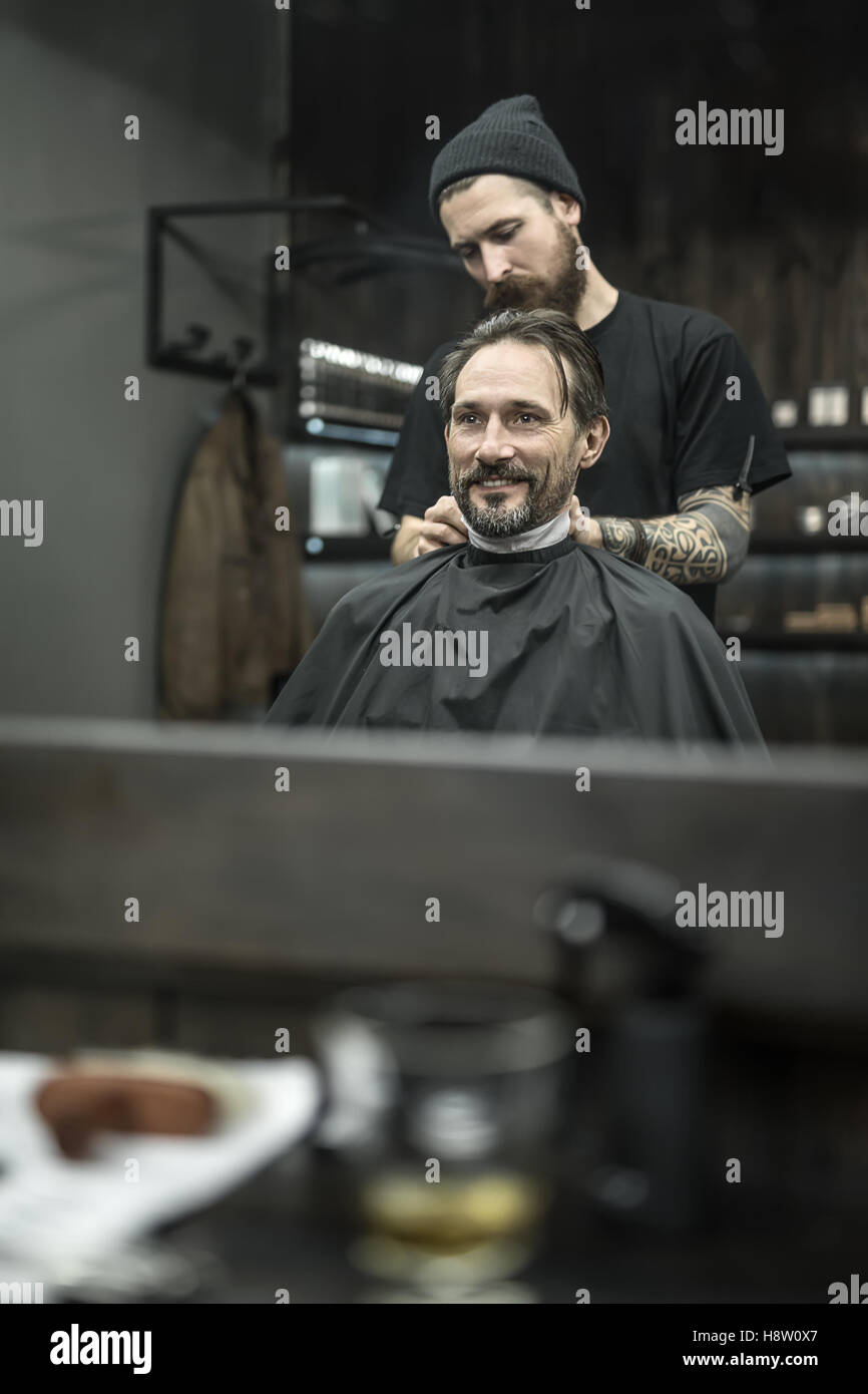 Stylish man in barbershop Stock Photo