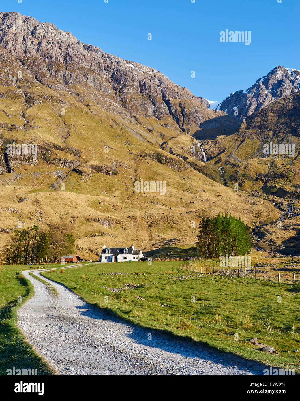 View of Achnambeithach, Glen Coe, Scotland, with mountain background. Stock Photo