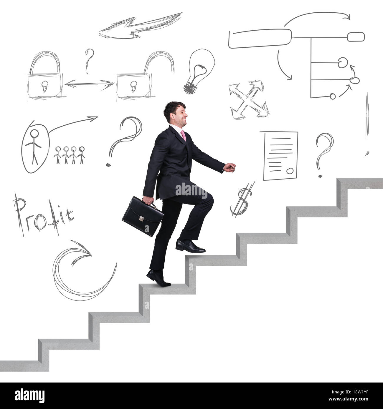 Businessman climbing the career stairs. Stock Photo