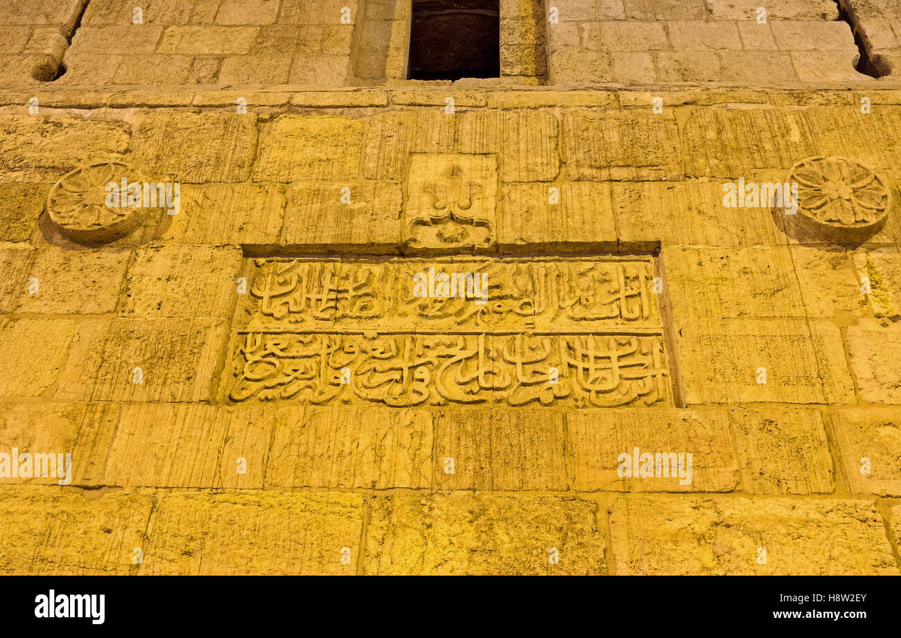 The facade of the Lions' Gate covered with old arabic calligraphy and floral patterns Stock Photo