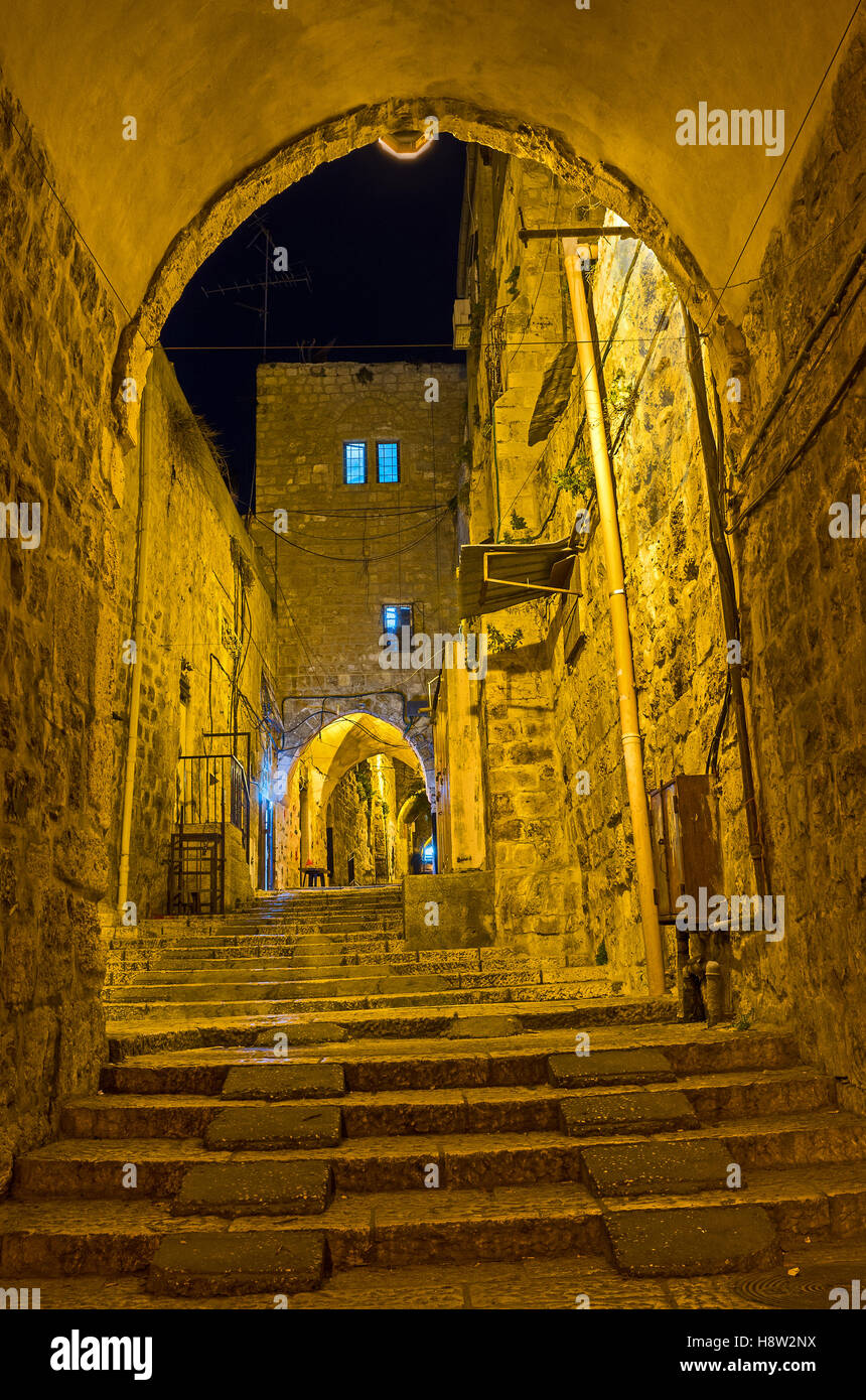 The narrow arched passage in Islamic Quarter leads to the Damascus Gate, Jerusalem, Israel. Stock Photo