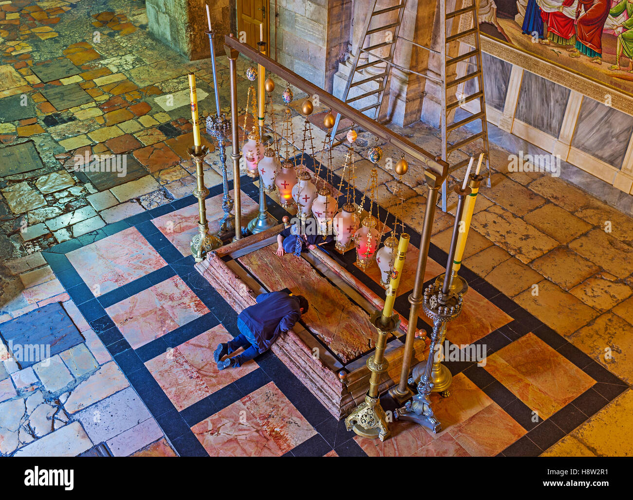 Man prays on his knees hi-res stock photography and images - Alamy