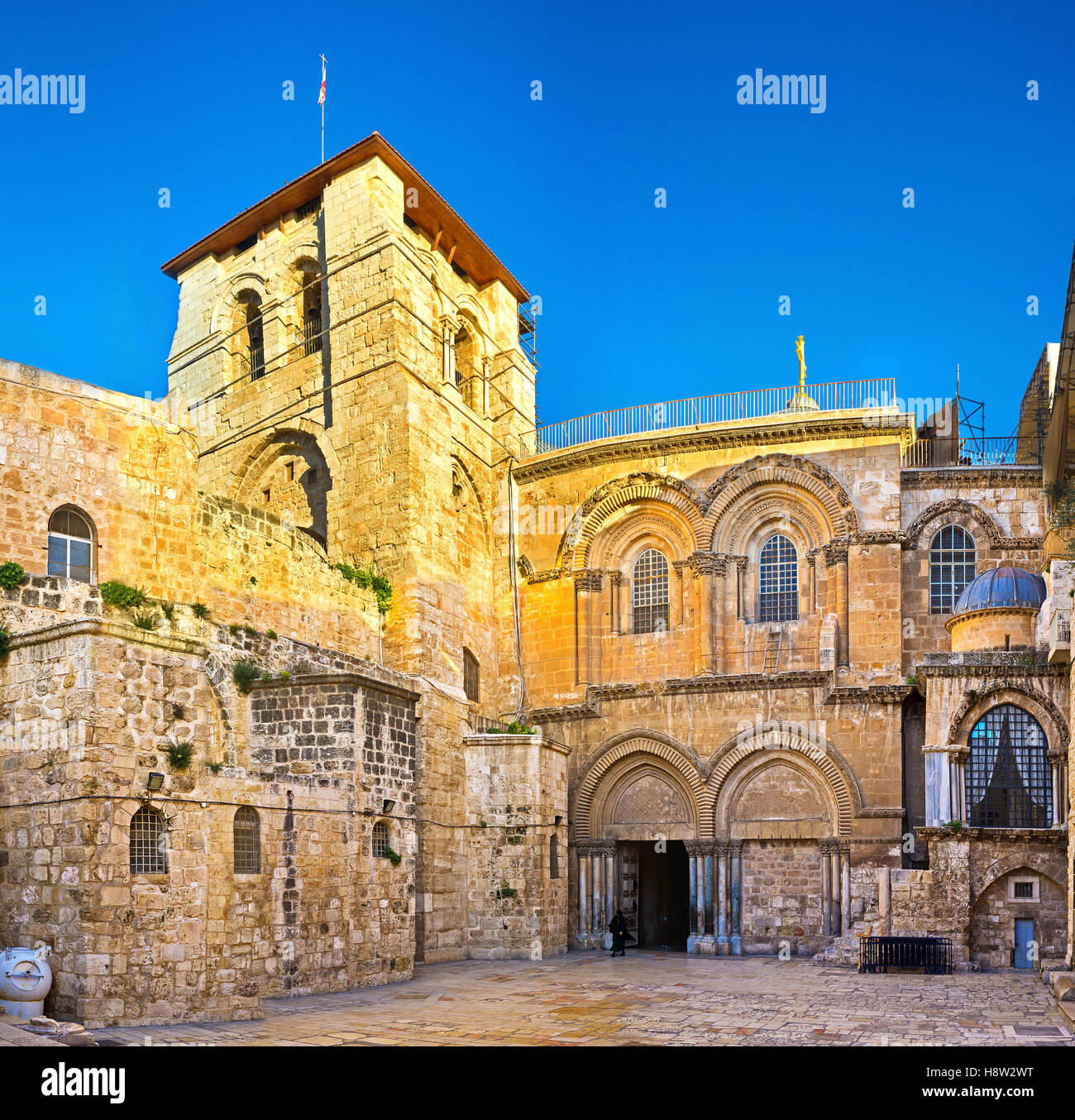 The tiny square (courtyard) in front of the Church of the Holy Sepulchre, one of the main landmarks of Jerusalem, Israel. Stock Photo