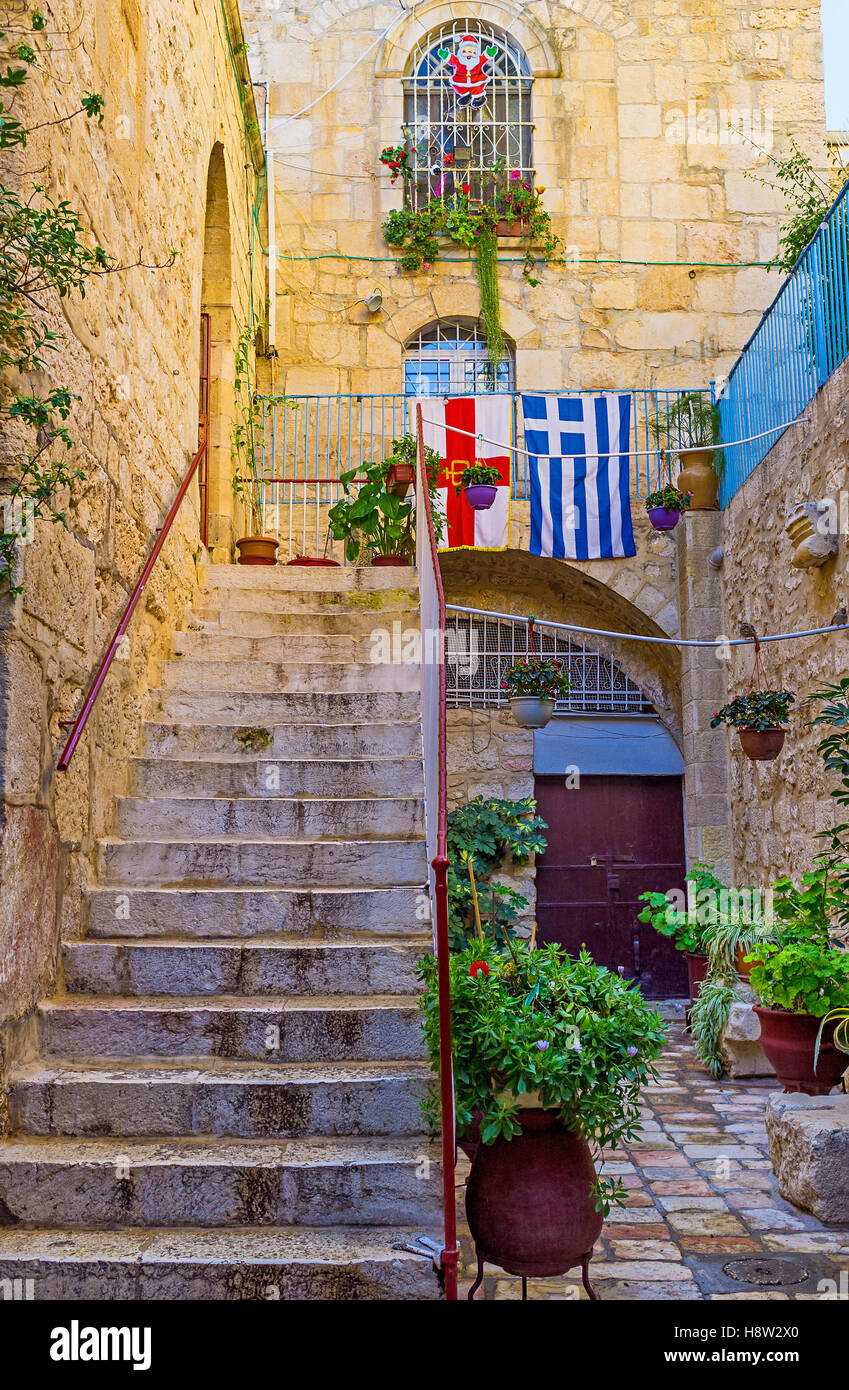 The courtyard of the small Greek Orthodox Monastery, known as Gethsemane Metoxion, located opposite the Church of the Holy Sepul Stock Photo