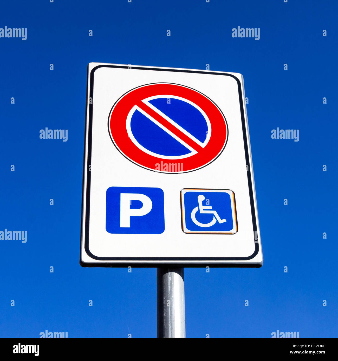 Handicap parking only sign for disabled drivers Stock Photo