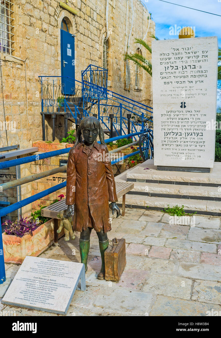 The statue of the little girl with her Teddy Bear (Mischke) is memorial to the children - victims of the Holocaust Stock Photo