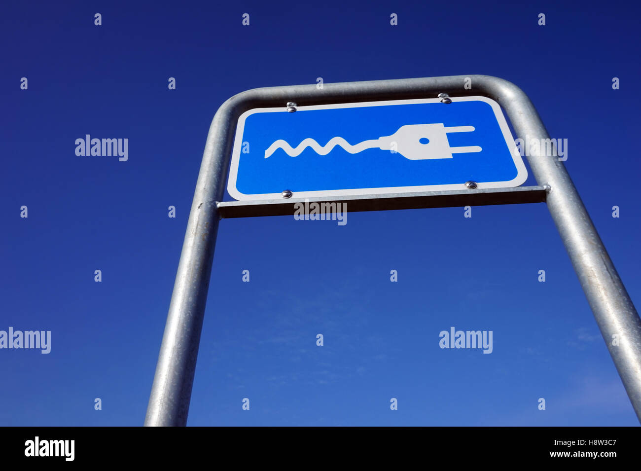 Street sign for electrical cars. Refueling the modern vehichle. Stock Photo