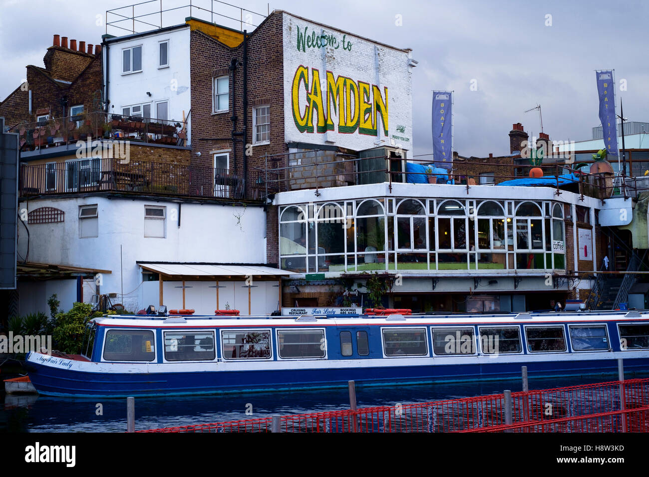 The cruising restaurant  narrowboat Fair Lady moored at Camden Town at Camden Lock on the Regents Canal Stock Photo