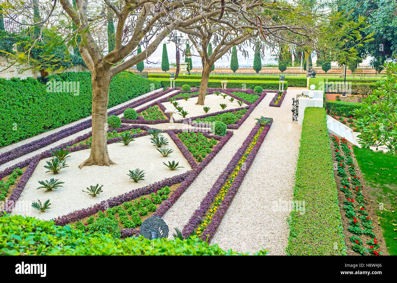 The patterns of the flower beds look like the carpet, covering the eart in Bahai Garden, Haifa, Israel. Stock Photo