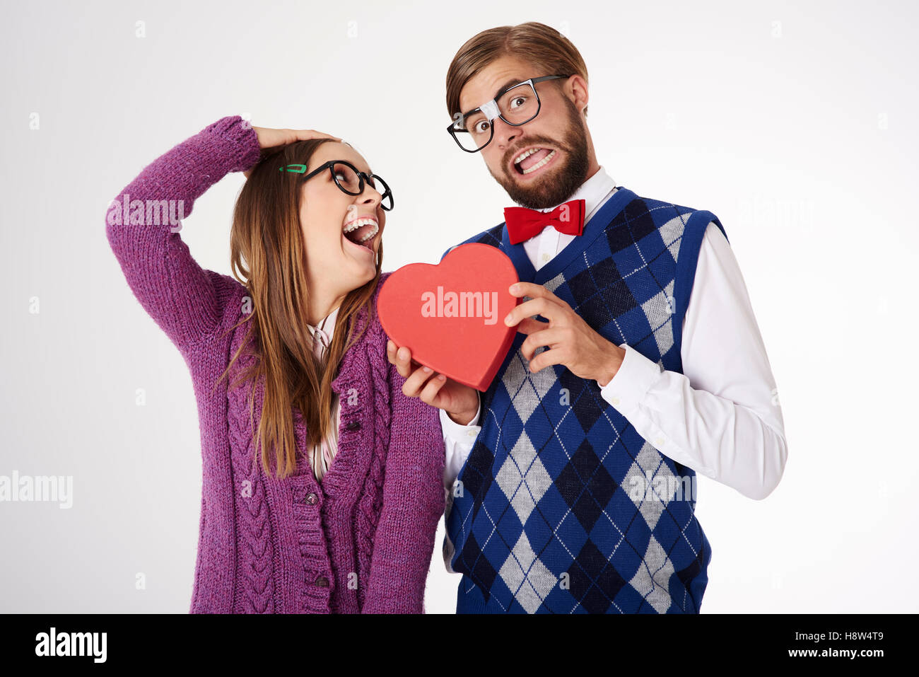 Young geeks falling in love Stock Photo