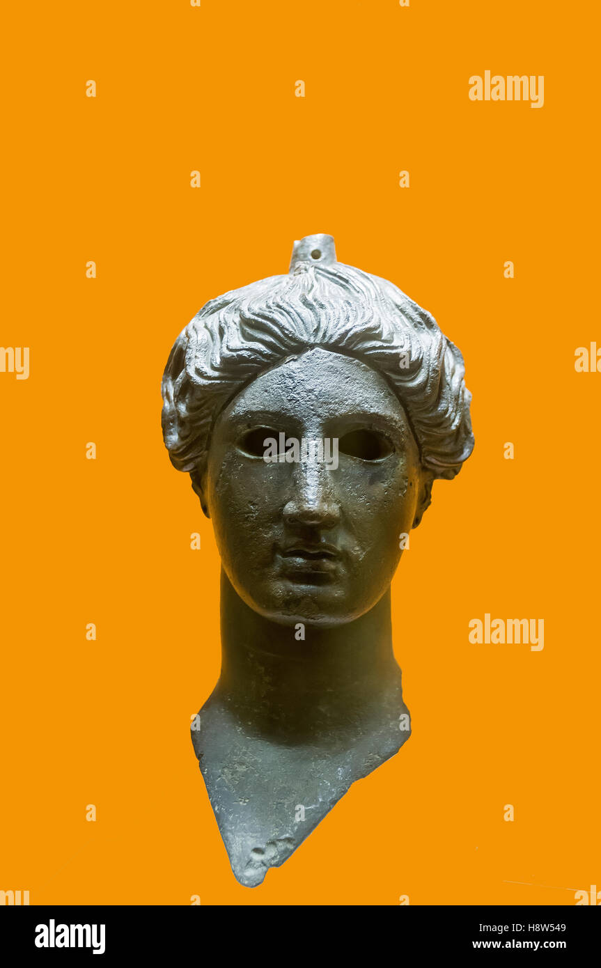 Greece, Athens, The Greek Agora museum in the Stoa of Attalos. Bronze head of Nike (victory) 420 BCE Orange background Stock Photo