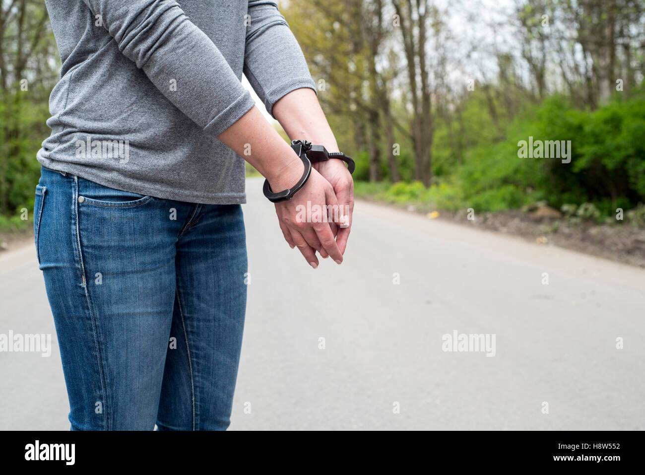 Photo of women handcuffed criminal police Stock Photo Alamy