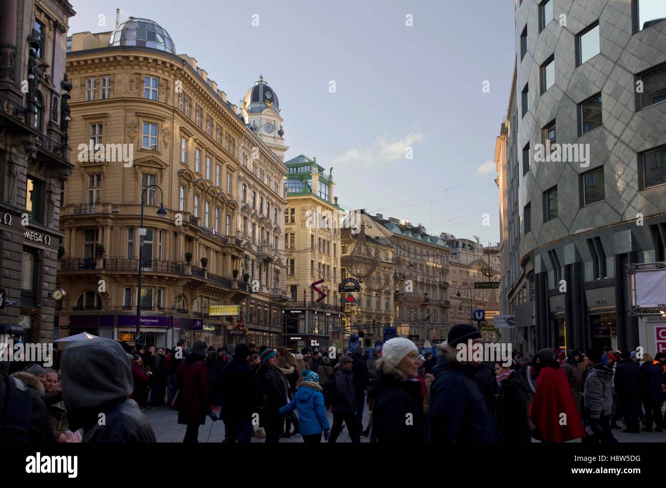 VIENNA, AUSTRIA - DECEMBER 31 2015: Graben street buildings and shops in Vienna at day time from Stephanplatz, with many people  Stock Photo