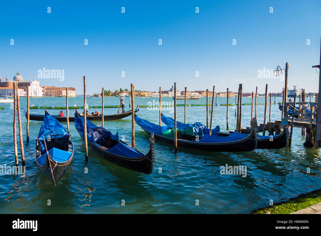 The lagoon at Venice with Gondolas Parked Stock Photo - Alamy