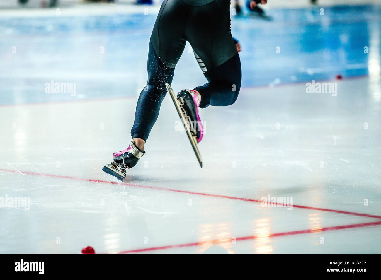 dynamic start athlete speed skater to sprint on ice rink. competitions