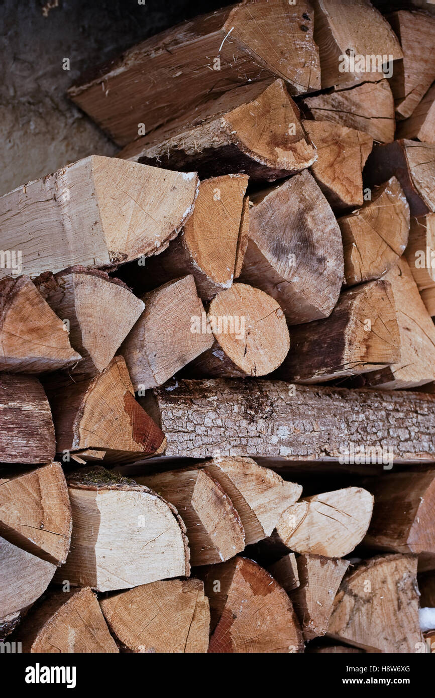 Pile of chopped fire wood logs. Ready for winter Stock Photo - Alamy