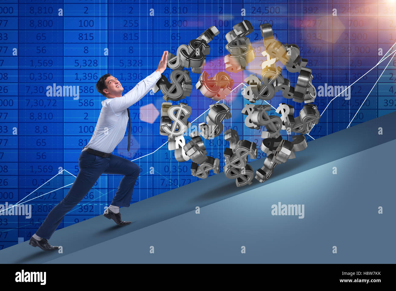 Businessman pushing away dollar ball Stock Photo - Alamy