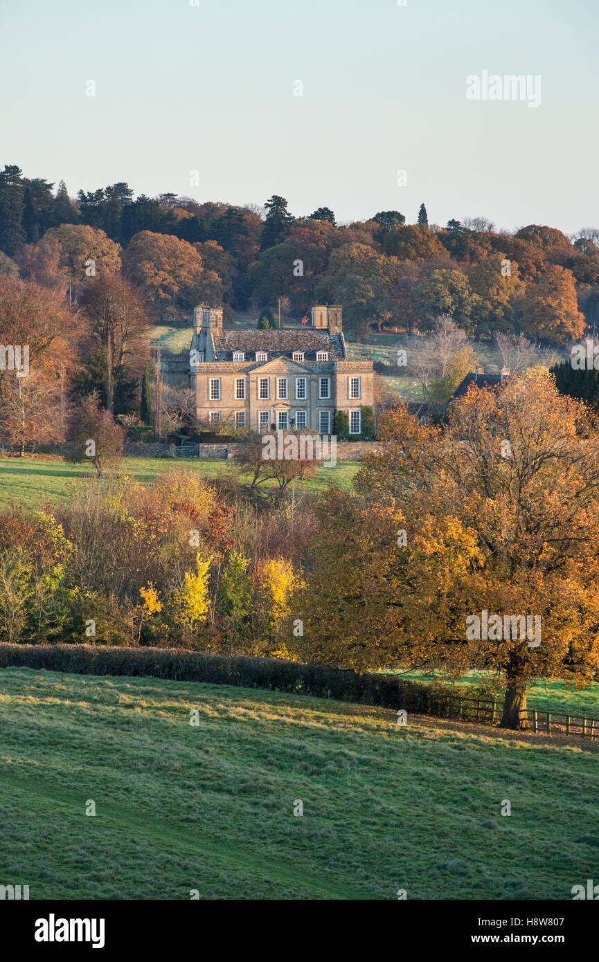 Bourton house in autumn at sunrise. Bourton on the hill, Cotswolds, Gloucestershire, England. Stock Photo