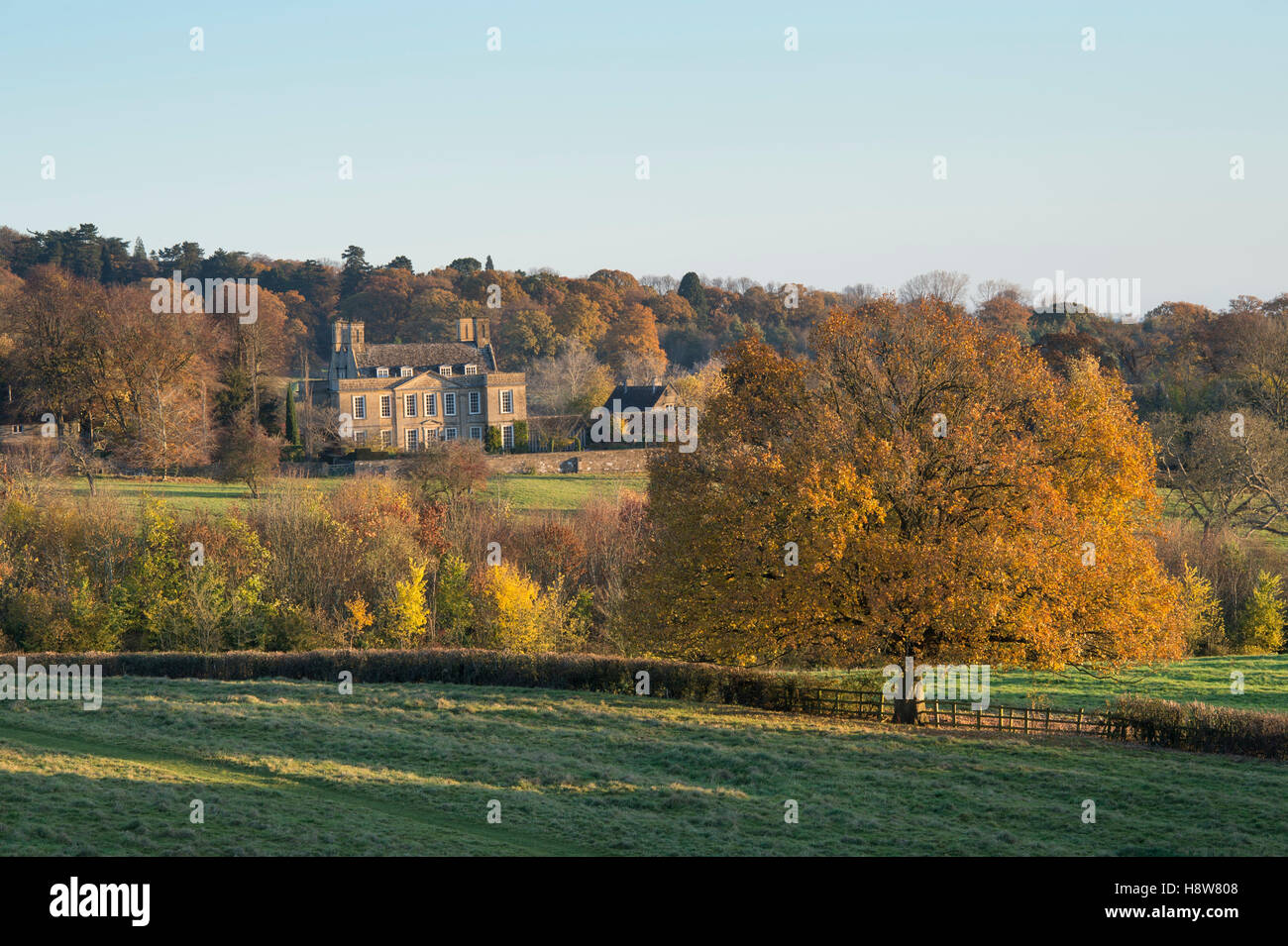 Bourton house in autumn at sunrise. Bourton on the hill, Cotswolds, Gloucestershire, England. Stock Photo