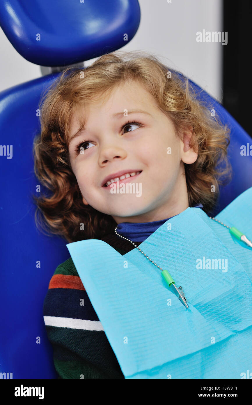 curly haired baby in
