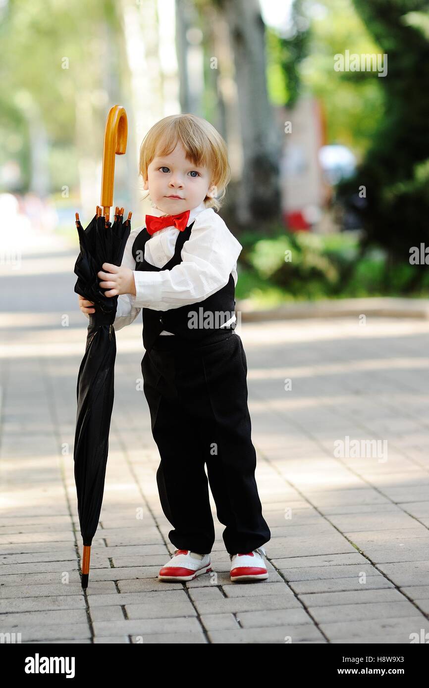 child with umbrella in hands Stock Photo Alamy