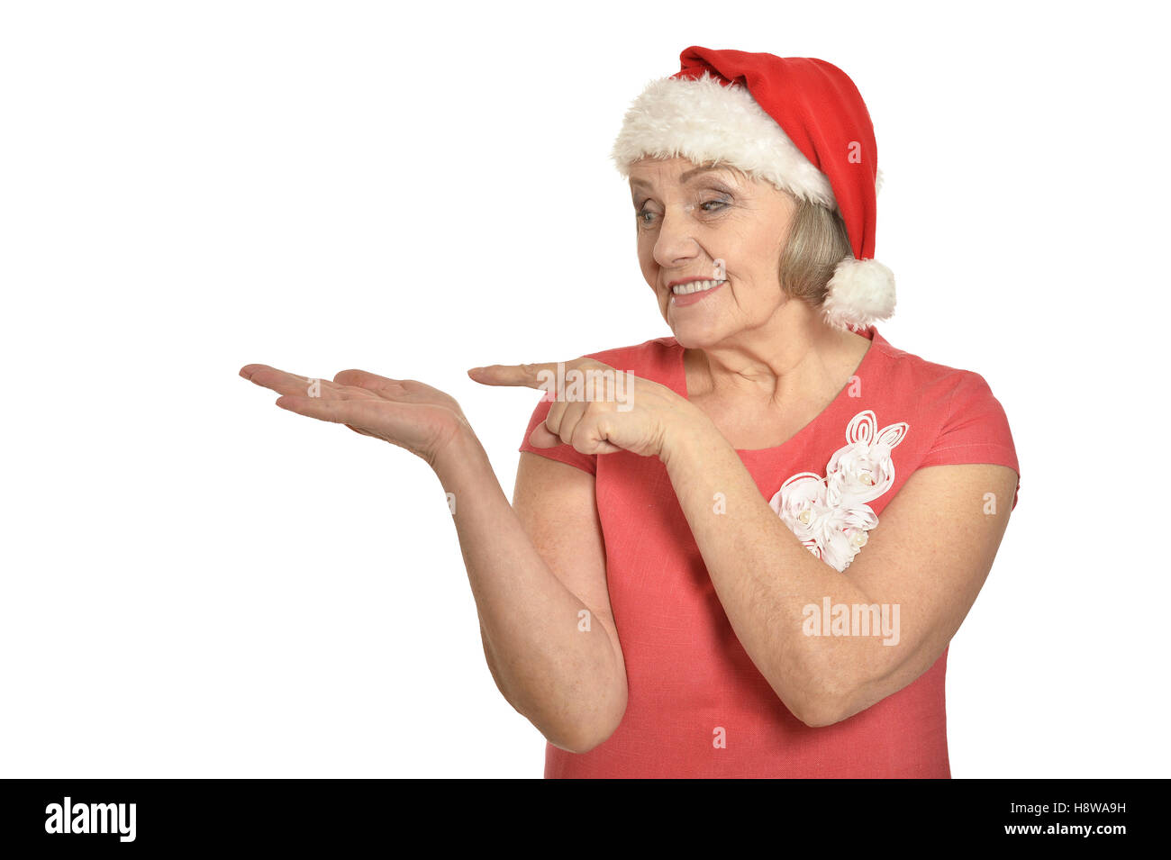 Senior woman in Santa hat Stock Photo - Alamy