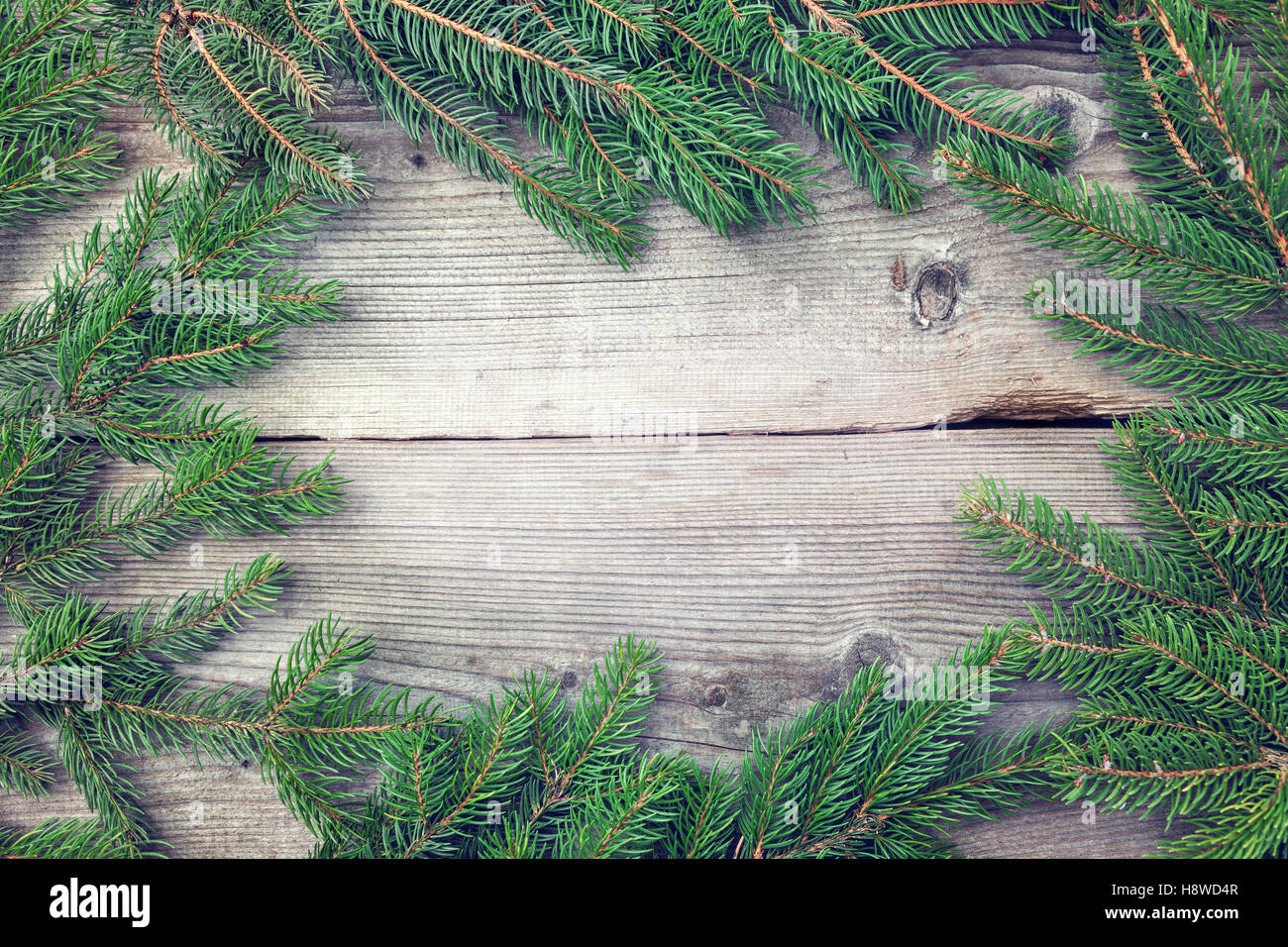 Wooden Christmas background with fir and copy space Stock Photo - Alamy